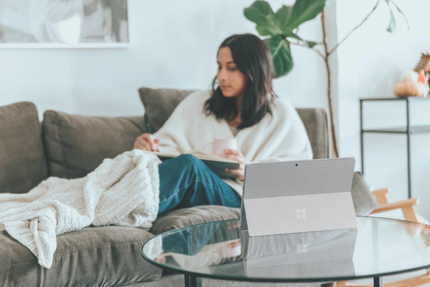 Professional meeting room with financial charts displayed on screens